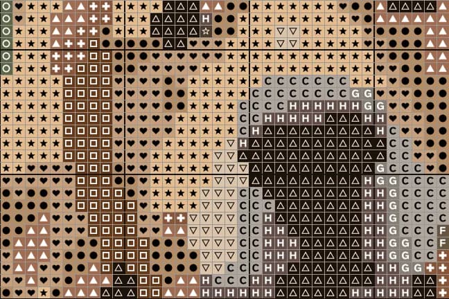 Close-up of the chart: colored squares with a symbol in each, and a bold line every ten stitches